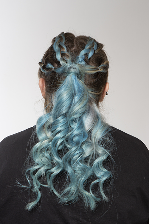 Back of student's head showing styled blue hair