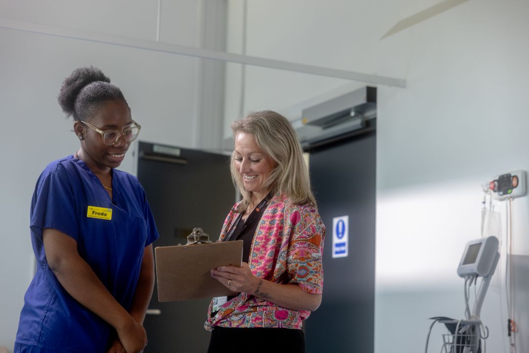 Apprentice working alongside experience staff