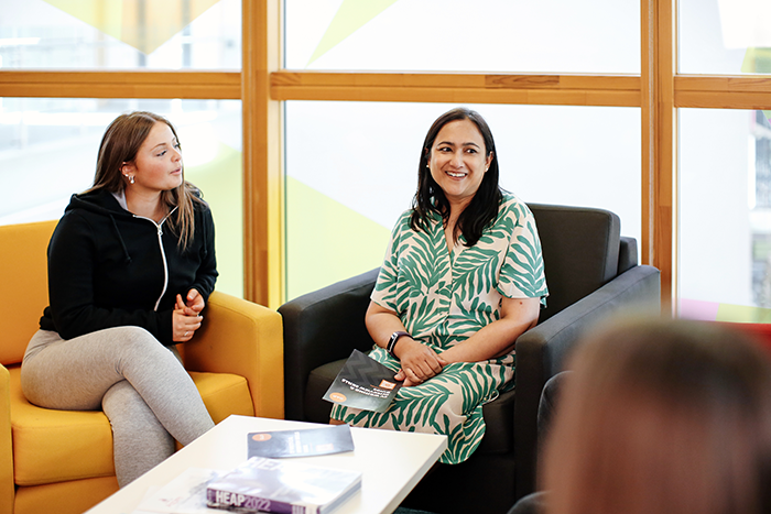 students talking to staff