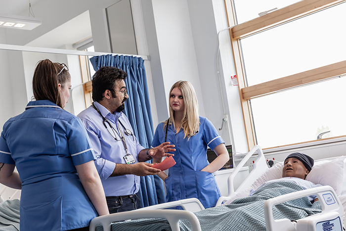 students and tutor in ward