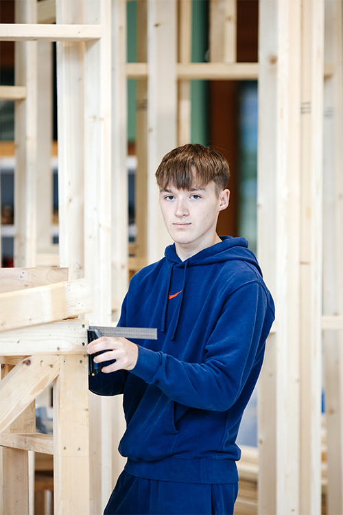 Student in a carpentry workshop