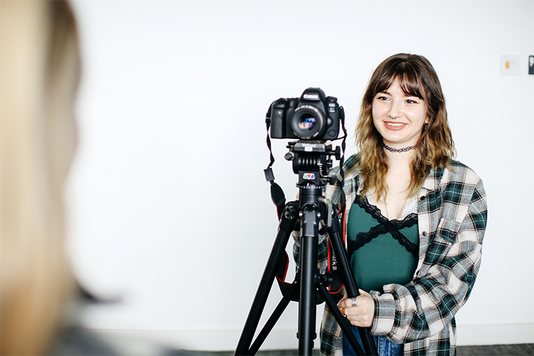 digital content production student on camera