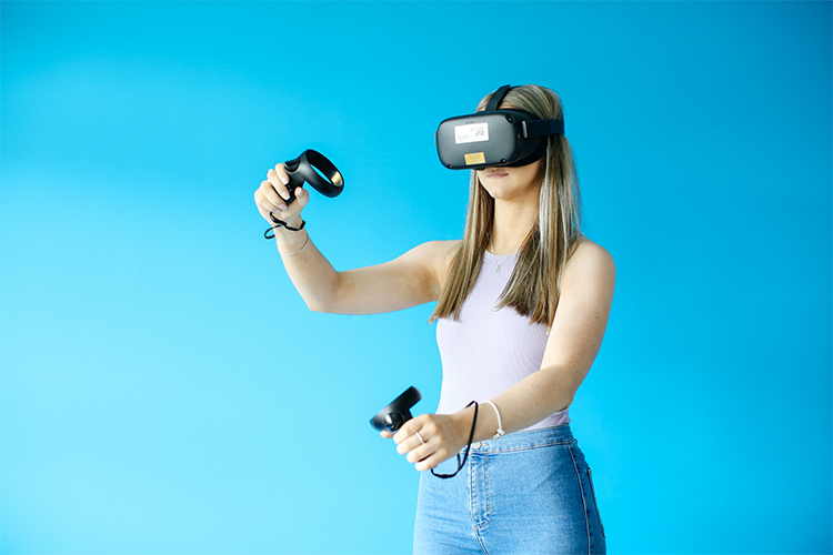 digital gaming student with virtual reality goggles