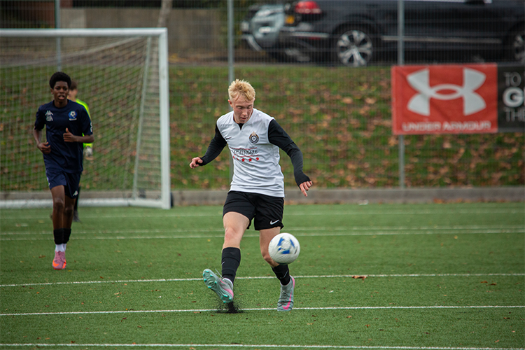 Player kicking a ball