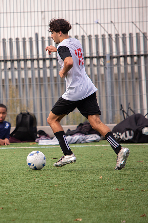 Footballer dribbling