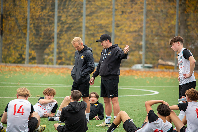 Coaches giving instructions