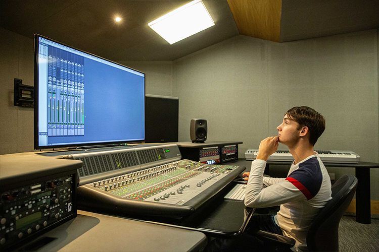 Student mixing music
