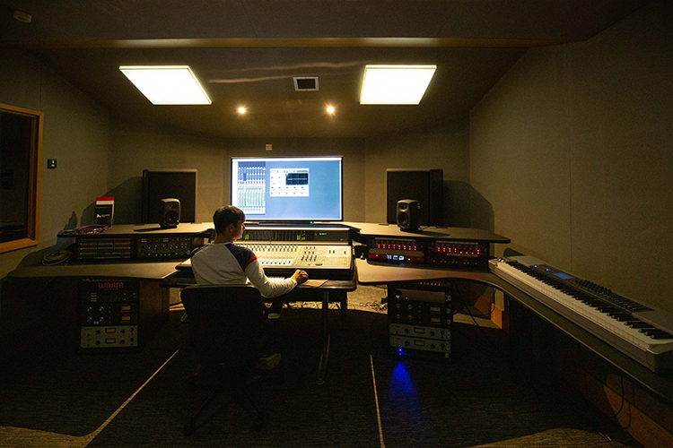 Student mixing music