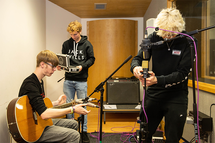 Students setting up a studio