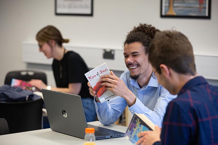 students reading books