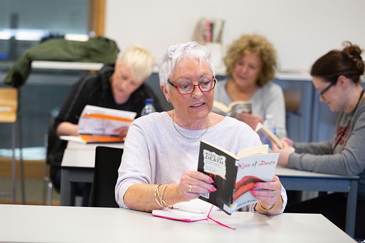 student reading a book