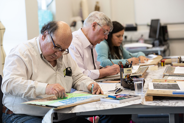 group of people drawing