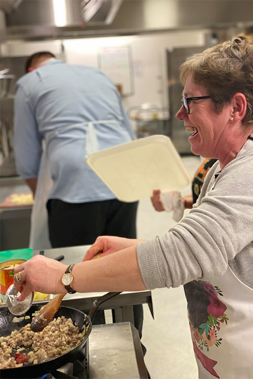 Student frying food