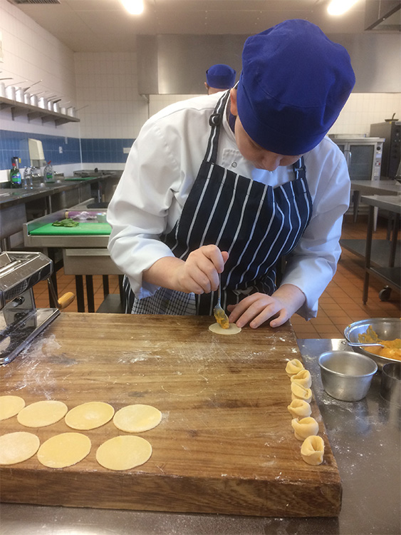 Student making vegan pasta