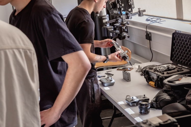 Student with photography equipment