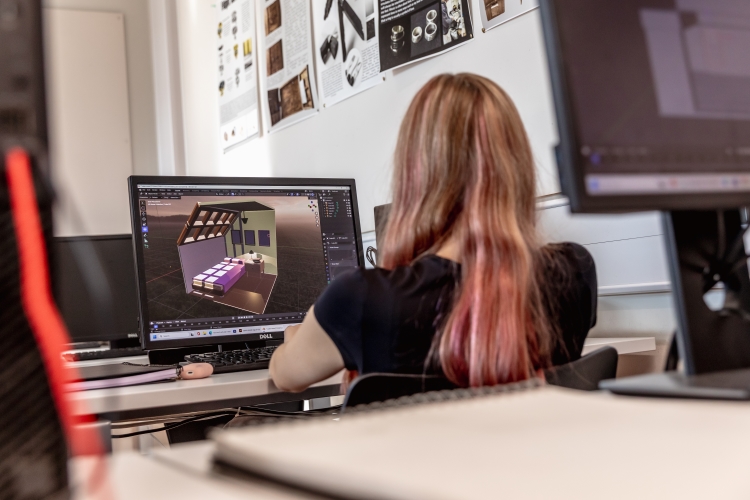 Student working on a Product and Craft project on computer