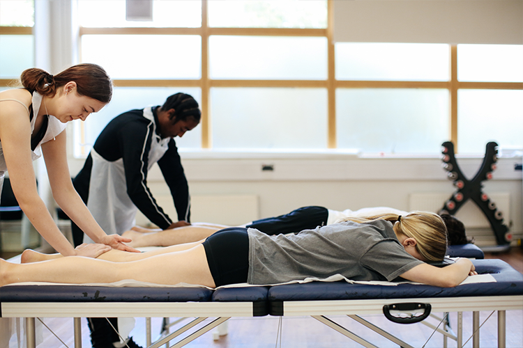 Students giving massages