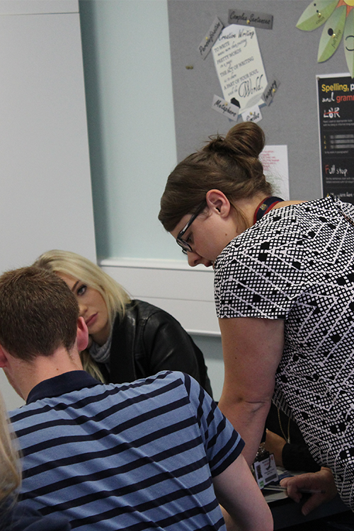 Teacher practicing helping a student one-to-one