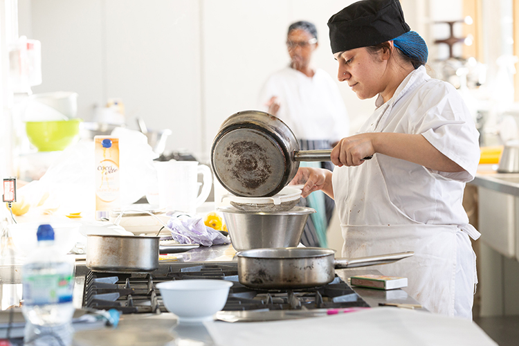 Student making a dessert