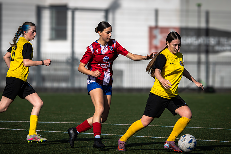 Footballer dribbling