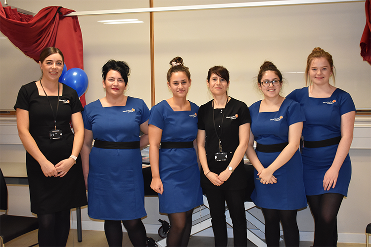 Group of students in beautician uniform