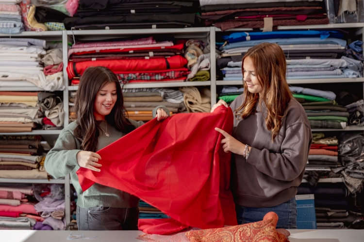 Students working with clothing materials