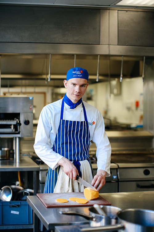 Student chopping food