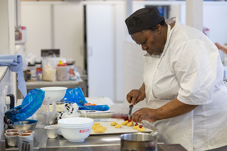 Student making a dessert