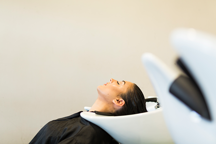 Person getting their hair washed