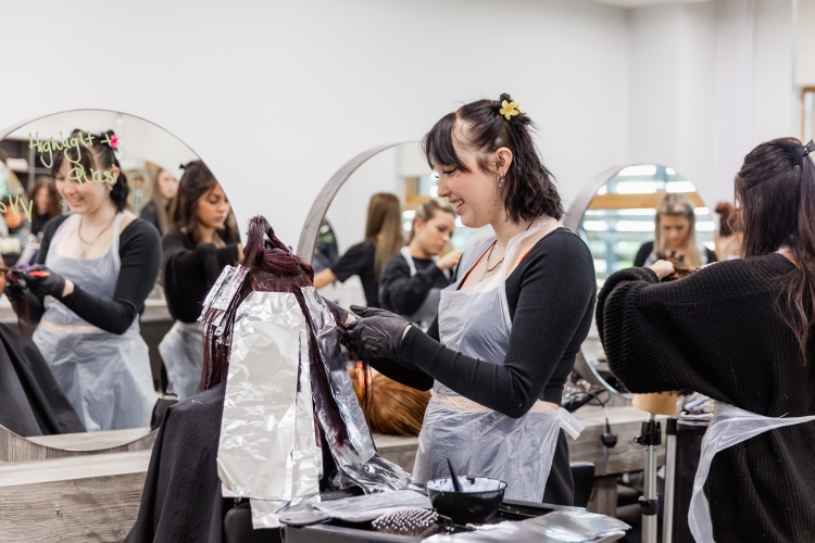 Student working on a hairdressing project