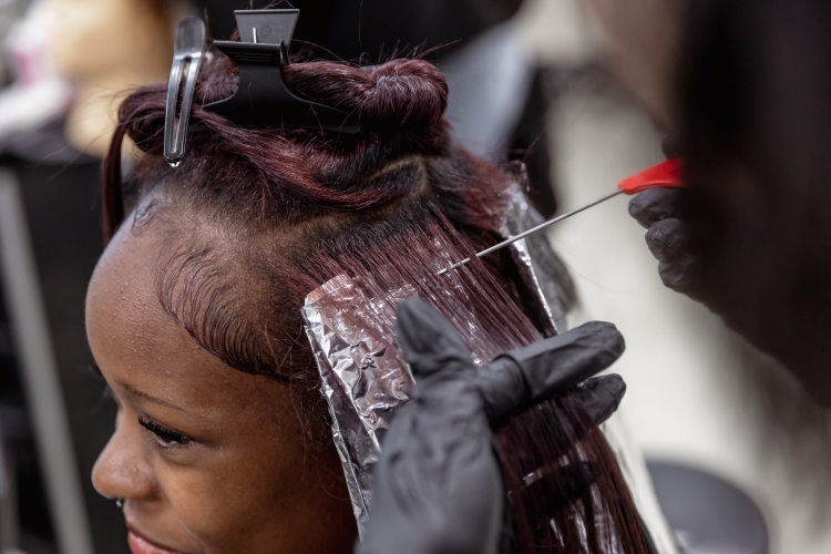 Student with hair foil in hair