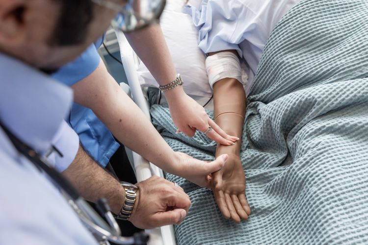 People checking a pulse 