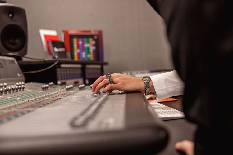 Student using producing equipment and software