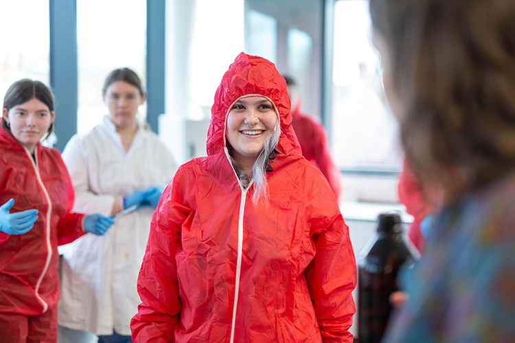 Student in hazmat suit