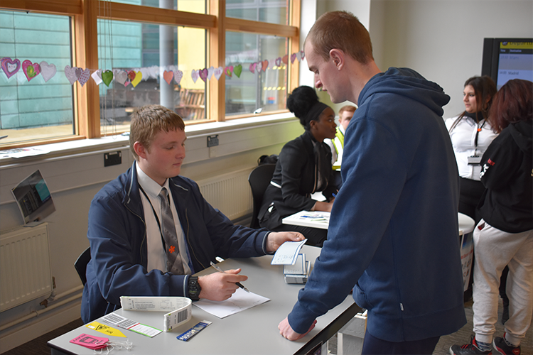 Student practicing working in an airport