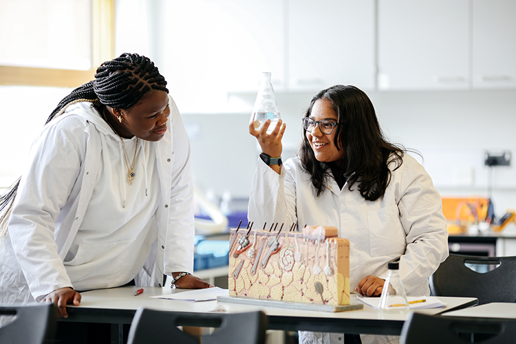 students doing a science experiment