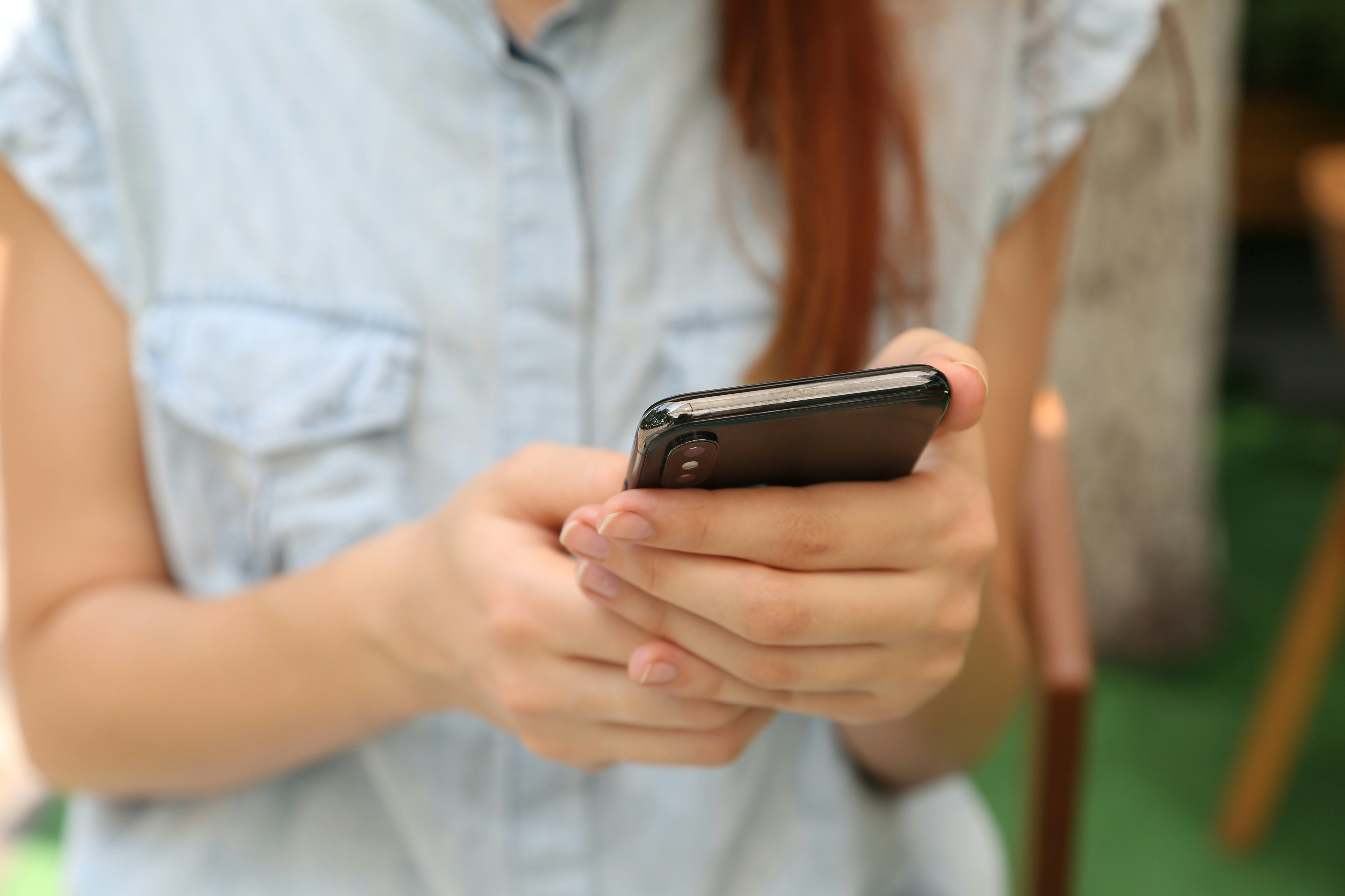 student on phone