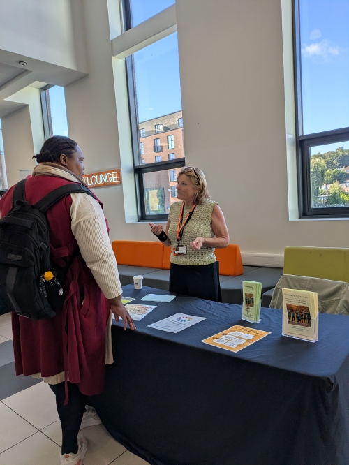 Student talking to an exhibitor
