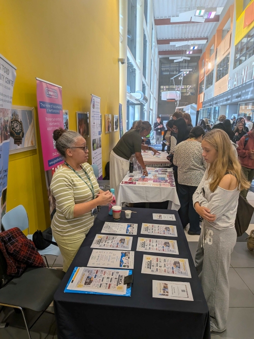 Student talking to an exhibitor