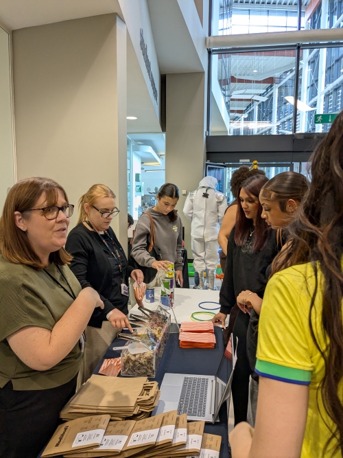 Students talking to an exhibitor